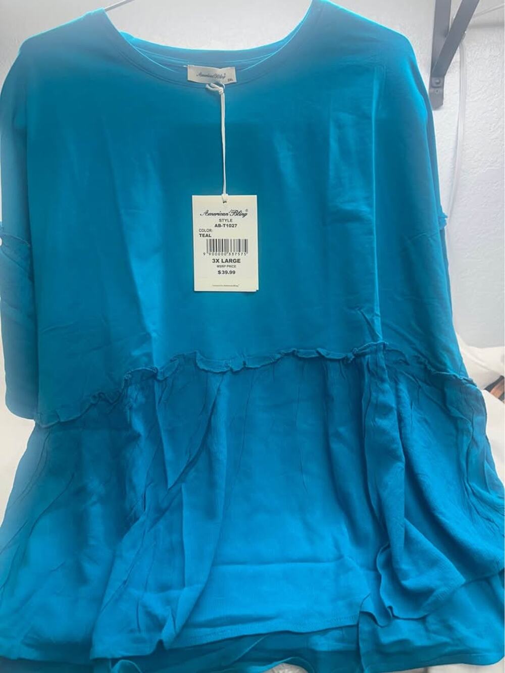 New boutique American Bling Teal Ruffle Flowy Tunic Top 3X. New w/tags. B1345